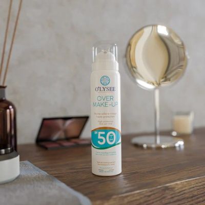 OLYSEE Over Make-up SPF 50+ Apsauginė purškiamoji priemonė nuo saulės
